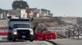 Road and sidewalk collapse in Santa Cruz, California, after strong storms