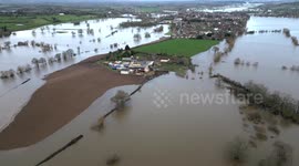 Incredible scenes as Worcestershire town almost cut off by flooding after river topples flood defences in England