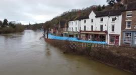 Flood barriers hold firm along River Severn in Ironbridge, England