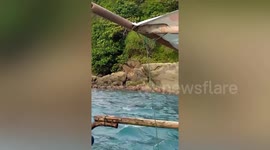 Locals visit penis-shaped rocky formation on island to 'improve performance in bed'