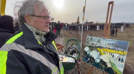 Artists make real-time paintings of heated climate demonstrations in Lützerath, Germany