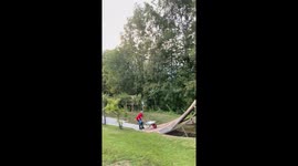 Unbelievably crazy stunt: Man on rollerblades does backflip on huge ramp and flips wheelbarrow