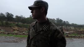 Engineers and support staff arrives to assist Santa Barbara County officials with re-directing the rain and creek water