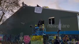Activist glueing himself to building in Lützerath, Germany