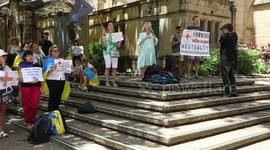 Ukrainians and their supporters protest against the Russian Red Cross