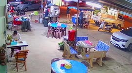 Street food stand burst into flames outside shop in Thailand