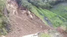 Landslide crashes onto road causing closure after heavy rain in the Philippines