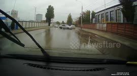 Accident: Car Loses Control and Smashes Into a Wall Disrupting Traffic