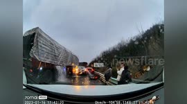 Icy highway sees dozens of vehicles involved in huge pile-up in China