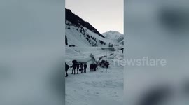 Indian Army officers rescue workers left stranded by avalanche in Jammu and Kashmir