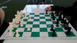 Palestinian students play chess during the first Chess Championship for schools