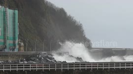 Waves crash over seawall as Storm Gerard hits northeastern Spain