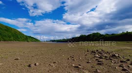 Dramatic drone footage contrasting extreme weather at reservoir in Yorkshire, UK