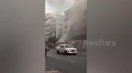 Bus bursts into flames sending terrified passengers fleeing in Bangkok