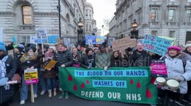 Striking nurses protest outside of Downing Street in protest over pay