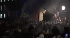 Flares set off outside Downing Street during protest against blocking of gender reforms