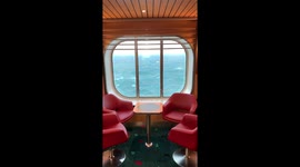 Relaxing view of ocean waves from a retro looking cruise ship