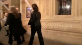 Elizabeth Hurley departs the Cirque Du Soleil Kurios Press Night being photographed by Paparazzi