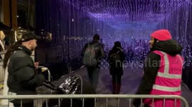 Long queue in London's Canary Wharf to see festival of lights
