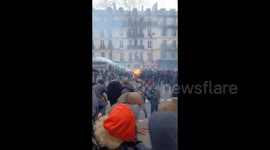 Police clash with protesters against pension reform in Paris, France