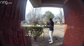 Bicyclist crashes into car coming out of driveway