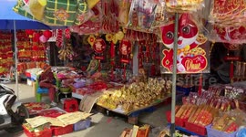 Crowded food market in Vietnam as people prepare for New Year celebrations