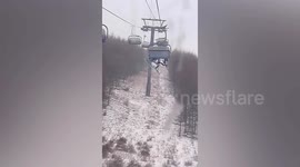 Terrifying footage shows boy, 8, falling from cable car at Chinese ski resort