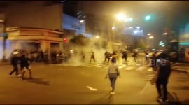 Clashes between police and demonstrators during protest in Peru