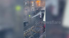 Dramatic pictures show burnt-out shell of London school bus - which caught fire with children inside, it is claimed