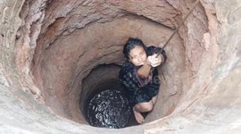 Trapped woman searching for child rescued from 15-meter well in Indonesia