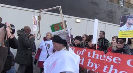 Protester wearing mock gallows with noose joins hundreds rallying against Iranian regime outside Downing Street in London