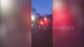 Footage shows a car engulfed in flames outside Buckingham Palace