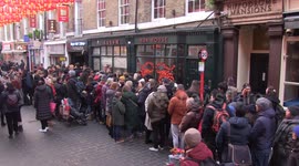 Hundreds queue for restaurants in London's Chinatown during Chinese New Year celebrations