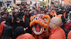London's Chinatown incredibly packed as dragon visits businesses for good luck