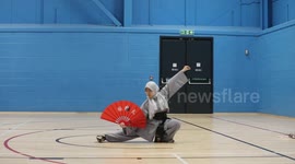 12-year-old girl becomes one of youngest people in UK to achieve black belt in Kung Fu