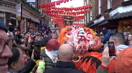 Chinese New Year 2023 celebrated with a Dragon Dance in London Soho