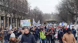 Parisian bakers hold baguettes as they protest over rising costs