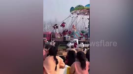 Tourists on swing ride in China flung into nearby truck