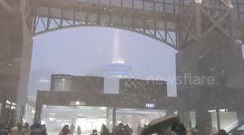 Snow whips through train station in Kyoto, Japan