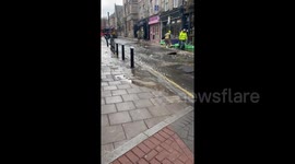 North London road turned into river after water main bursts