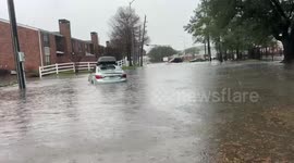 Flooded Streets in Houston with abandoned cars