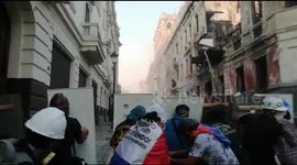 Intense footage shows Peruvian riot police clashing with anti-government protesters in Lima; tear gas unleashed
