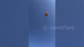 Flying tent interrupts student scout's training when it was swept away by winds