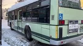 Bus stuck on icy road amid heavy snow in Japan