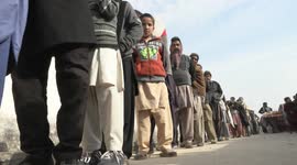 Pakistan wheat shortage: Locals queue to buy wheat flour at government-controlled prices in Islamabad