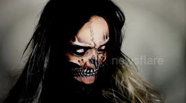 Watch this makeup artist transform herself into spooky vampire skull