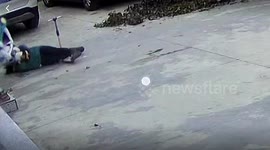 Woman dives across ground to catch baby tumbling down stairs
