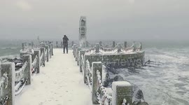 City coated in snow and ice as cold snap hits eastern China
