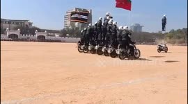 Performers balance on bikes and ladders during Republic Day celebrations in India