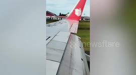 Plane crashes into airport building damaging wingtip in Indonesia
